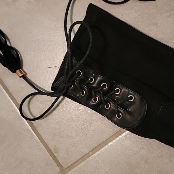 Knee-length boots with gold heel accent, side zipper, and adjustable back laces. - Picture 13 of 14